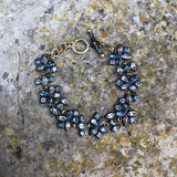 Malena Asymmetrical Gem Bracelet- 18ct Solid Gold & Black Silver - Aquamarines & Topaz
